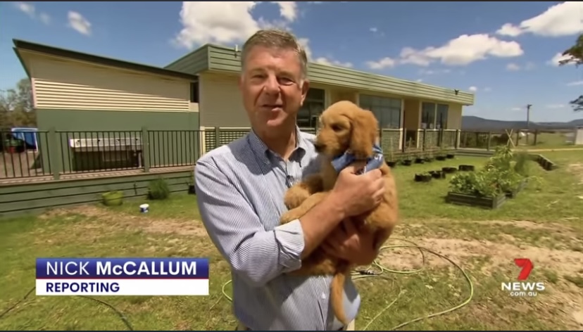 Reporter with pup
